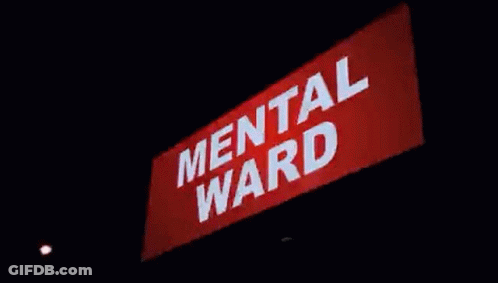 Woman Laying In Hospital Bed With Blue Pillows GIF