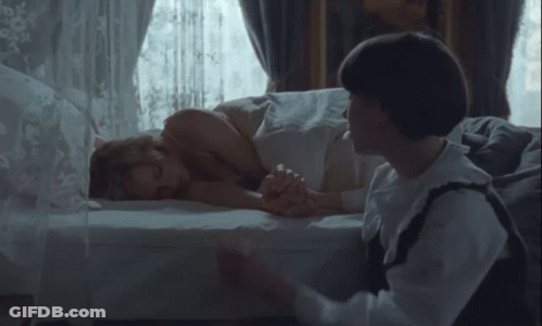 Woman Laying On Bed Man Holding Hand GIF