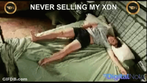 Woman Laying On Bed Never Selling My XDN GIF