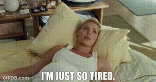 Woman Laying On Bed Saying I'm Just So Tired GIF