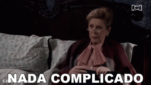 Woman Laying On Bed Saying Nada Complicado GIF