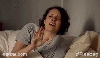 Woman Laying On Bed With Hands On Chest GIF