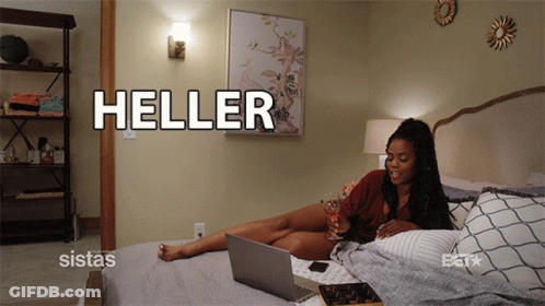 Woman Laying On Bed With Laptop And Wine Heller GIF