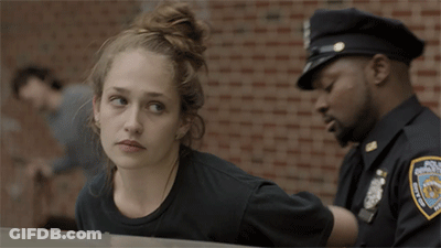 Woman Laying On Car Hood While Police Officer Watches GIF