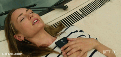 Woman Laying On Car Hood With Netflix Logo GIF