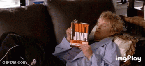 Woman Laying On Couch Reading Don't Jump GIF
