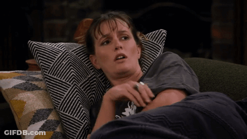 Woman Laying On Couch Wearing I Love You T-Shirt GIF