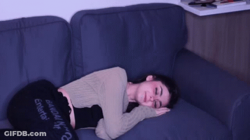 Woman Laying On Couch With Bandai NYC Pants GIF