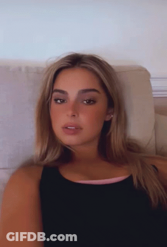 Woman Laying On Couch With Eyes Closed GIF