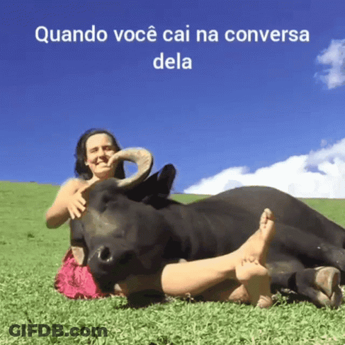 Woman Laying On Grass With Bull Quando Você Cai Na Conversa Dela GIF
