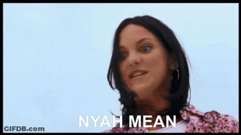 Woman Laying On Ground Saying Nyah Mean GIF