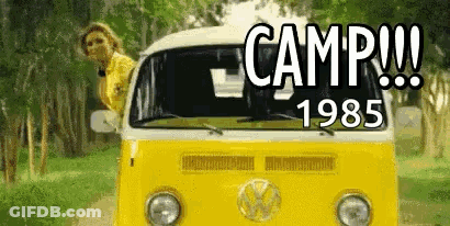 Woman Leaning Out Of Yellow Van Camp 1985 GIF