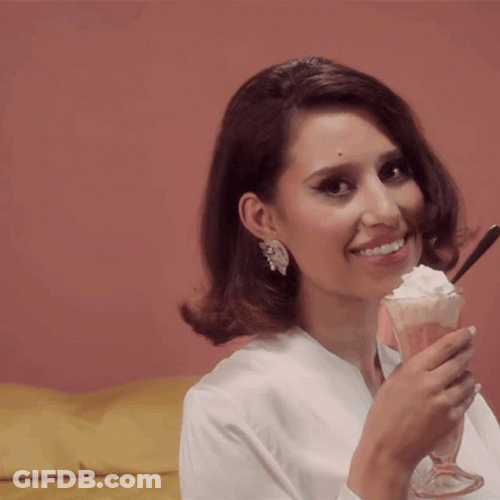 Woman Licking Whipped Cream GIF
