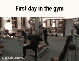 Woman Lifting Dumbbell In Front Of Tric Sign GIF