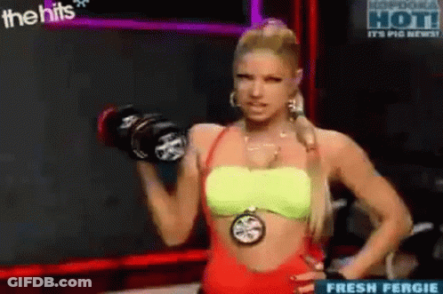 Woman Lifting Dumbbell On TV Show In Bikini Top GIF