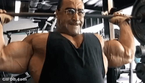 Woman Lifting Dumbbells In Gym GIF