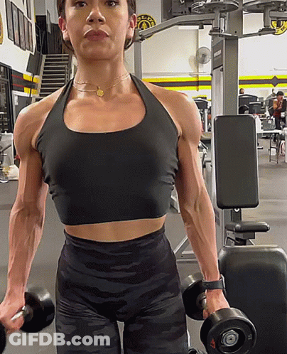 Woman Lifting Dumbbells With Gold's Gym Logo GIF