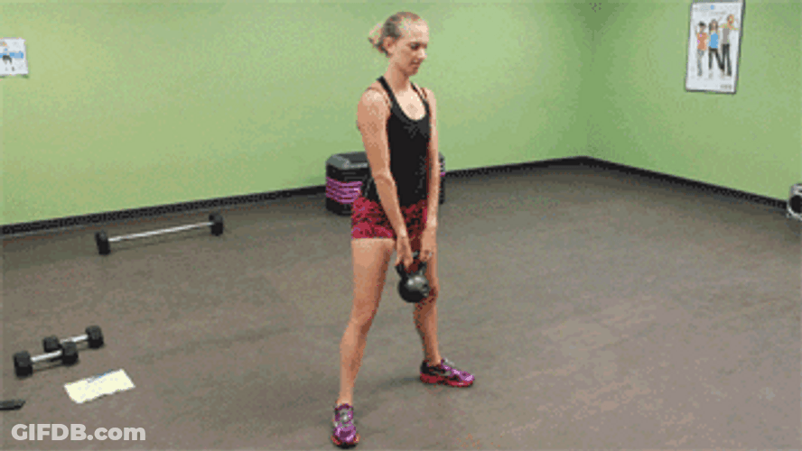 Woman Lifting Kettlebell Squats GIF