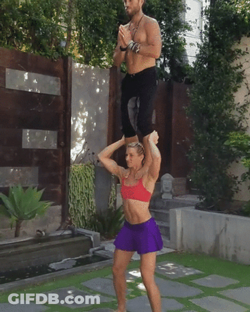 Woman Lifting Man Squats GIF