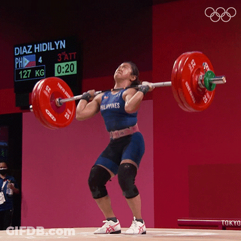 Woman Lifts Barbell With Diaz Hidilyn Behind Her GIF