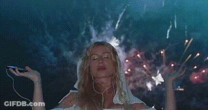 Woman Listening To Music Watching Fireworks GIF