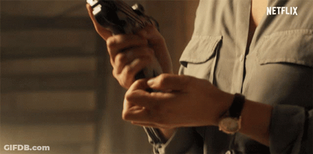 Woman Loading Gun GIF