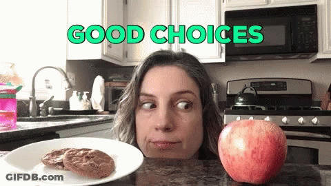 Woman Looking At Apple And Cookies Good Choices GIF