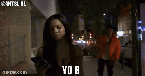 Woman Looking At Cell Phone Says Yo B GIF