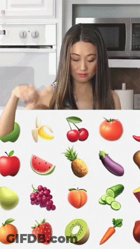 Woman Looking At Fruit And Vegetables GIF