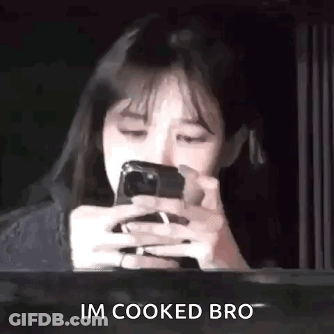 Woman Looking At Phone Saying I'm Cooked Bro GIF