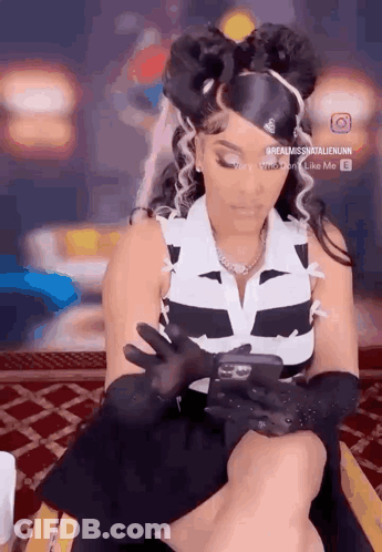 Woman Looking At Phone Wearing Gloves GIF