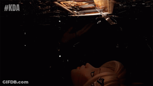 Woman Looking At Reflection In Broken Mirror GIF