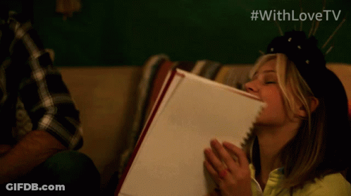 Woman Looking At Skull Drawing #Withlovetv GIF