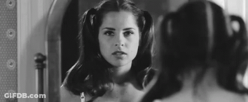 Woman Looking In Mirror Black And White GIF