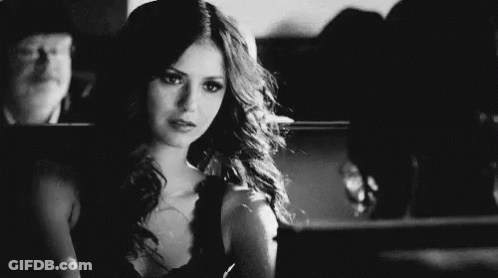 Woman Looking In Mirror GIF