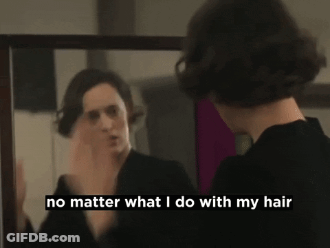 Woman Looking In Mirror It Just Keeps Falling GIF