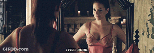 Woman Looking In Mirror Saying I Feel Good GIF