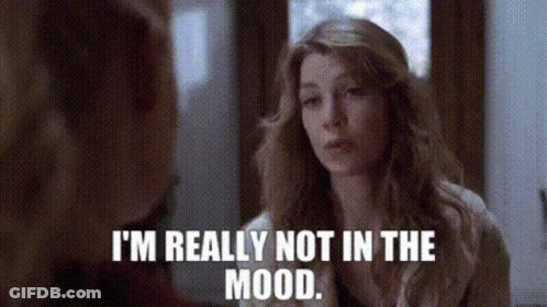 Woman Looking In Mirror Saying I'm Really Not In The Mood GIF