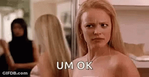 Woman Looking In Mirror Saying Um Ok GIF