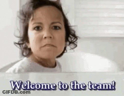 Woman Looking In Mirror Saying Welcome To The Team GIF