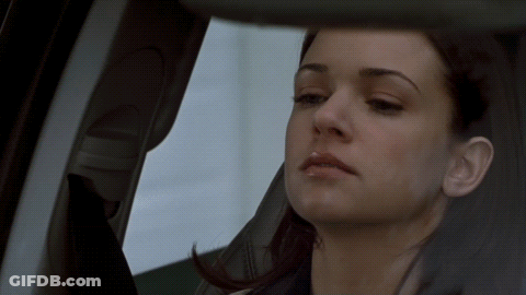 Woman Looking Out Car Window GIF