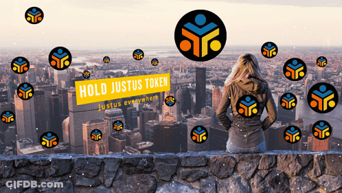 Woman Looking Over City With Justus Token Text GIF