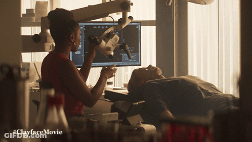 Woman Looking Through Microscope #ClayfaceMovie GIF