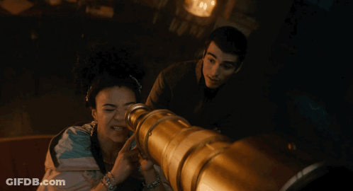 Woman Looking Through Telescope With Man GIF