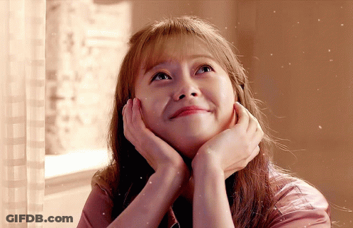 Woman Looking Up With Hands On Face GIF