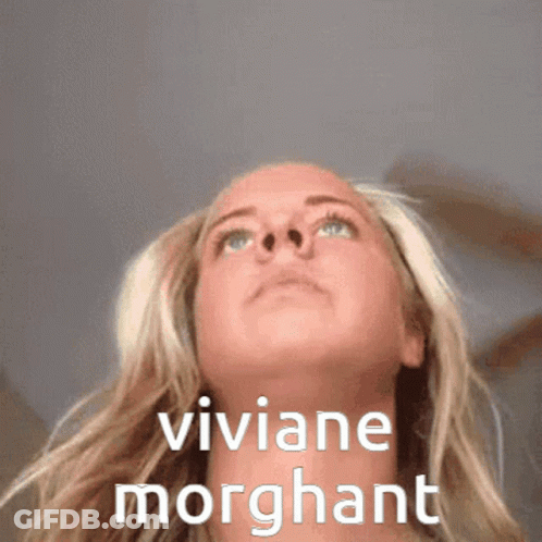 Woman Looking Up With Viviane Morgant Written On Her Face GIF