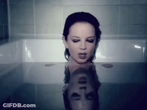 Woman Lying In Bathtub Reflection GIF