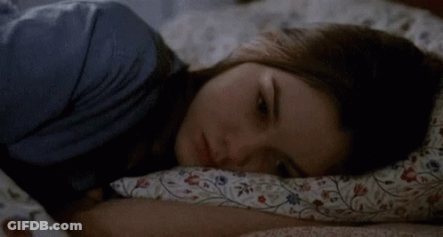 Woman Lying In Bed With Pillow GIF