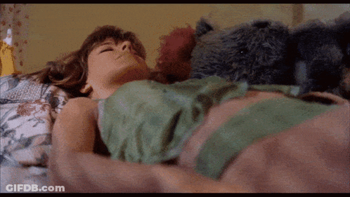 Woman Lying In Bed With Teddy Bear GIF