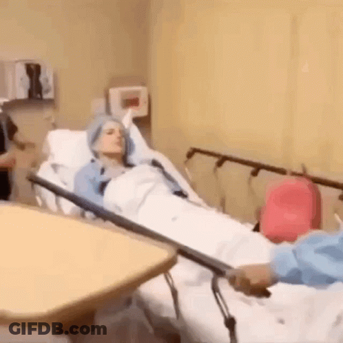 Woman Lying In Hospital Bed GIF